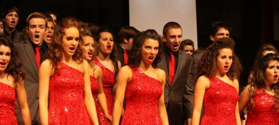 The varsity show choir, Impulse, performs their first song "Doomsday." Their dark and tragic opener sets the horrific tone to the End-of-the-World themed performance directed by Mr. Aaron Behnke. At the Main Event in Epworth, Iowa, the team placed first in the day round and accomplished an outstanding second place finish in finals.