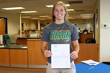 Maddy Nilles, 15, signed a letter of intent Nov. 12 to compete for the North Dakota State Bison in track and field.