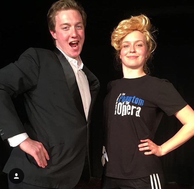Andrew Wagner, 16, poses next to Lela Udry, 17, who played Wagner in the Senior skits. 