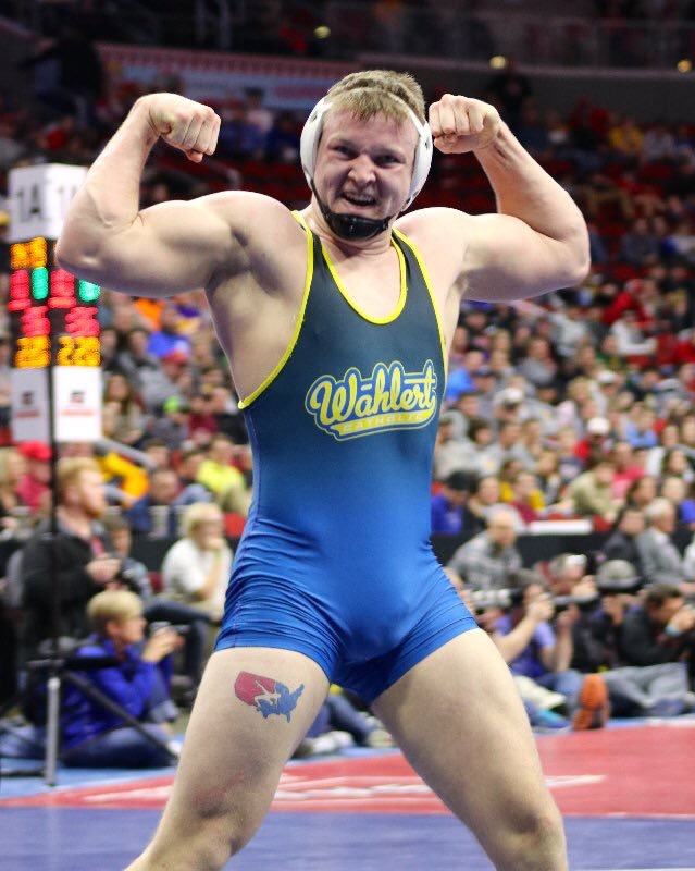 Flexing+his+way+to+the+top%21%0ABoone+McDermott%2C+18%2C+celebrates+as+he+wins+his+individual+weight+class.+McDermott+also+helped+Wahlert+win+their+first+ever+title+as+a+team.+