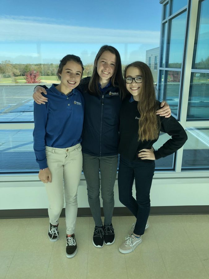 Tess Breslin, Tessa Berning and Andrea Swift, 22, are taking one step at a time as class officers to change Wahlert.