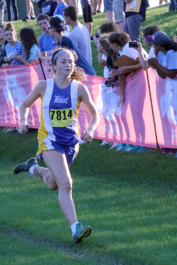 Hustling Huseman
Finishing the race strong, Aunna Huseman is one of the leading runners for the girl's cross country team.