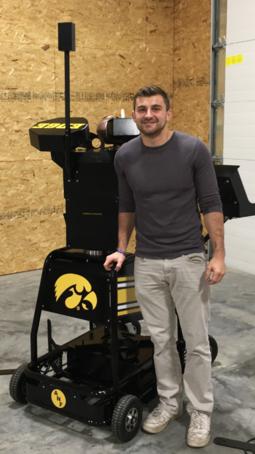 Nate Pierroti, 12, standing next to the Seeker that he created this past year. 