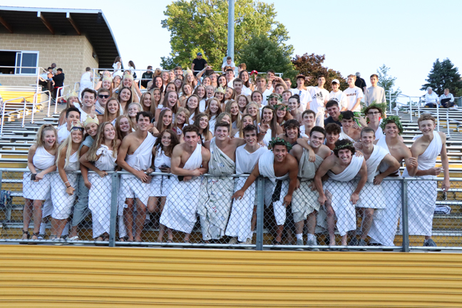 The NEST at the first football game of the season cheering on their classmates. 